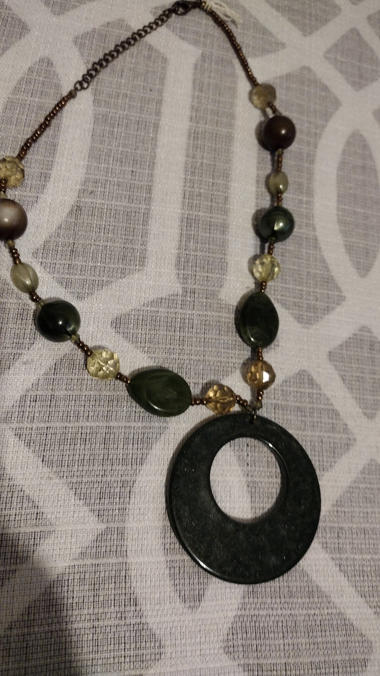 Women emerald green emblem necklace