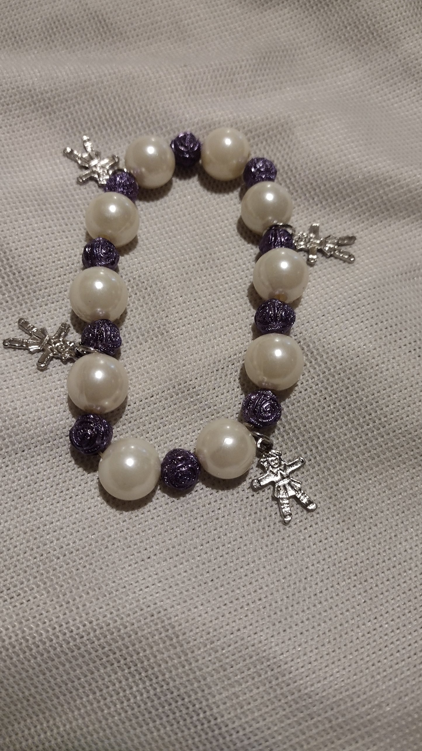 Women's cream/purple charm stretch bracelet